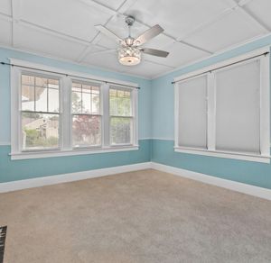 Empty, well-lit space for training with minimalist design.